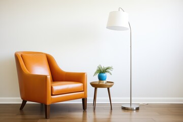 sleek floor lamp beside a leather reading chair