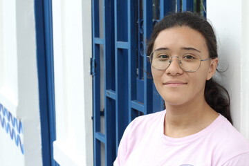 Natural young woman wearing glasses 