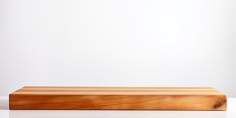 Wooden tabletop on white background - ideal for showcasing or merchandising your items.
