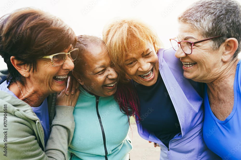 Wall mural multiracial senior women having fun together after yoga class outdoor - healthy lifestye, sport and  - Wall murals