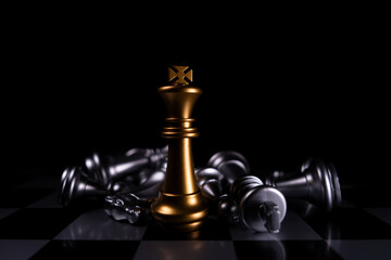 Golden King chess is last standing in the chess board, Concept of successful business leadership