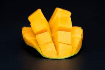 Mango slices isolated on the black background
