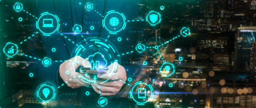 Businessman using smart mobile phone with blurred background in Internet of Things, Ai Artificial Intelligence, digital data transfer, cloud computing and digital marketing concept