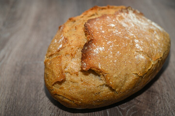homemade freshly baked bread on a wooden table 19