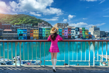 Naklejka premium Tourist visiting around Colorful Zhengbin Fishing Port in Keelung, Taiwan.