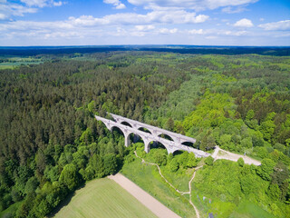 Aerial view of old concrete railway bridges in Stanczyki, Mazury, Poland