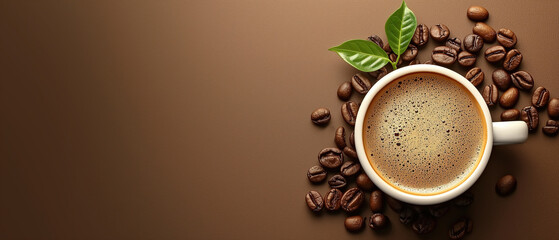 Top view cup of coffee and grains on a brown background, banner with copy space. Coffee day concept