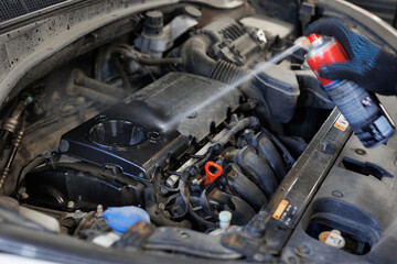 Car engine close-up. Flushing the engine after oil change.