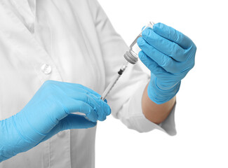 Doctor filling syringe with medication from glass vial on white background, closeup