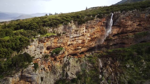 Drone footage of the scenic Tithorea Falls in Velitsa Gorge in Tithorea, Amfikleia-Elateia, Greece