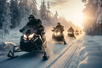Fotobehang People riding snowmobile in the winter © Golden House Images