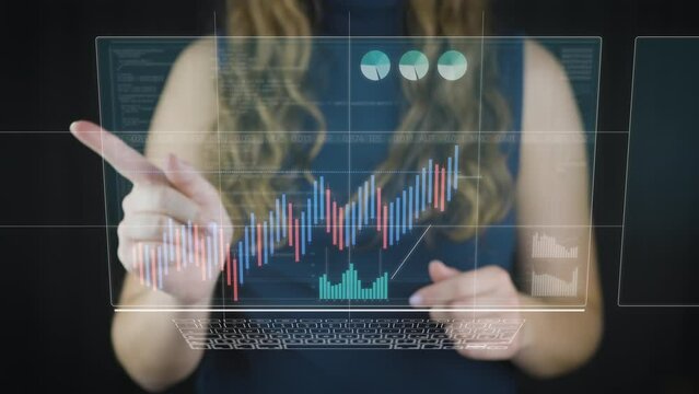 Female model using future touch screen scrolls through various stock market financial data with graphs, charts and price trends