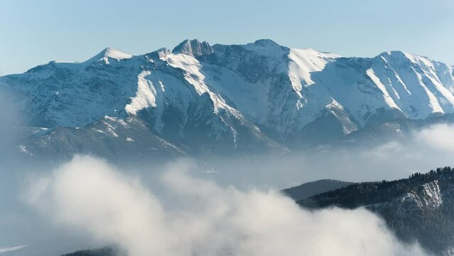 Time lapse Mountain Olympus winter telephoto snow covered peaks sunny