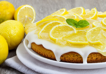 Lemon drizzle cake topped with lemon slices