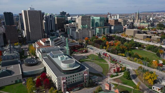 Ottawa city hall and skyscrapers in background, aerial parallax view