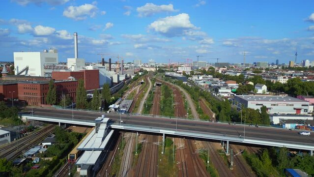 Bridge station train suburban railroad Tracks Berlin. Nice aerial top view flight panorama overview drone
4k footage