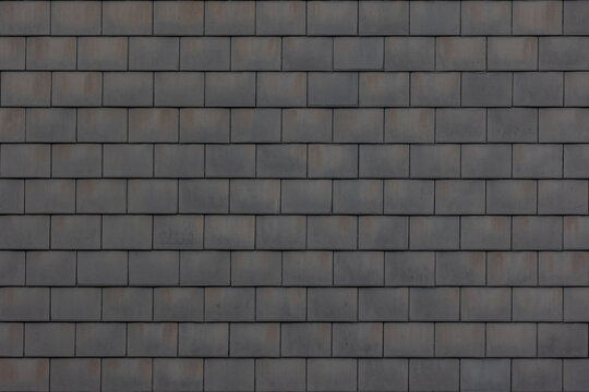 Old dark grey stone tiles with rust stain, Abstract shingles bricks texture, Geometric pattern background, Details of roof top material, Can be used as background for display or montage your products.