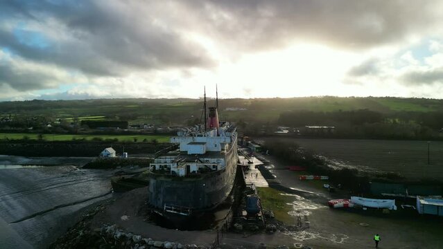 Ghost Ship the Duke of Lancaster at sunset - drone low level clockwise rotate from rear - Mostyn, North Wales, UK