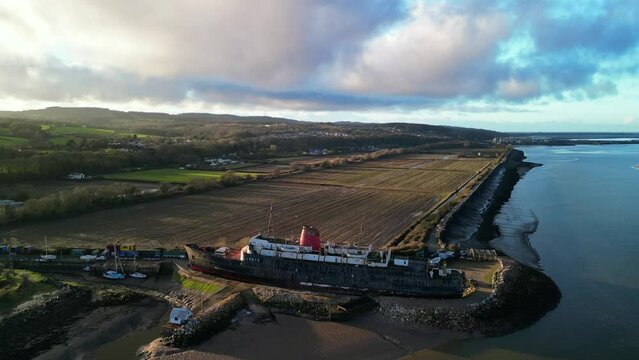 Ghost Ship the Duke of Lancaster at sunset - drone move in close - Mostyn, Wales, UK