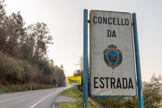 A Ponte Ulla, Spain. Road sign indicating directions to Concello da Estrada