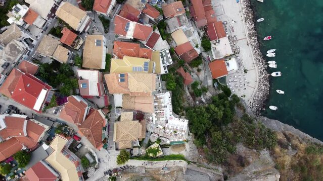 Epic drone shot reveals Parga seaside town and landscape, Greece