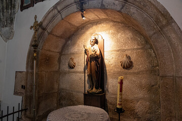 A Ponte Ulla, Spain. Statue of Saint John the Baptist inside the Parish Church of Santa Maria Magdalena, a Galician Baroque Catholic temple - obrazy, fototapety, plakaty