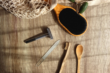 Crochet bag, wooden hairbursh, face roller, reusable razor, glass nail file, wooden toothbrush and...