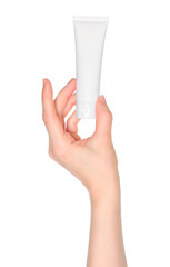 Woman hand holds a white cosmetic cream tube, on white background close-up, template for cosmetics ads