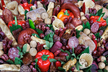 Sausage of different types on the counter in the store. Trade in meat products of good quality.