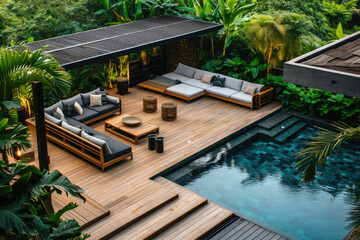 high view of a lavish side outside garden at morning, with a teak hardwood deck and a black pergola. Scene in the evening with couches and lounge chairs by the pool