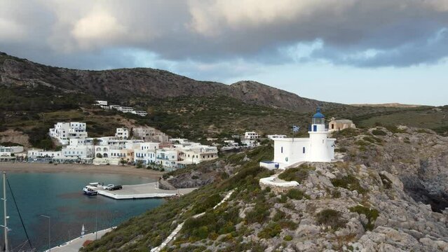 Kapsali Beach Bay Village with Lighthouse and Greece Flag, Kythira Greek Island