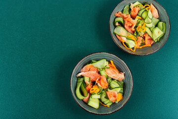 Fresh fish salad with raw cucumber.