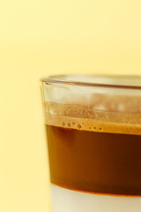 coffee on a cup on a colored background