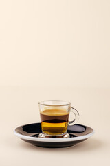 coffee on a cup on a colored background