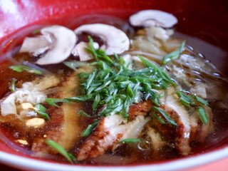 A bowl of soup in close-up