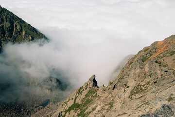 Low clouds in a valley in the French Pyrenees in France