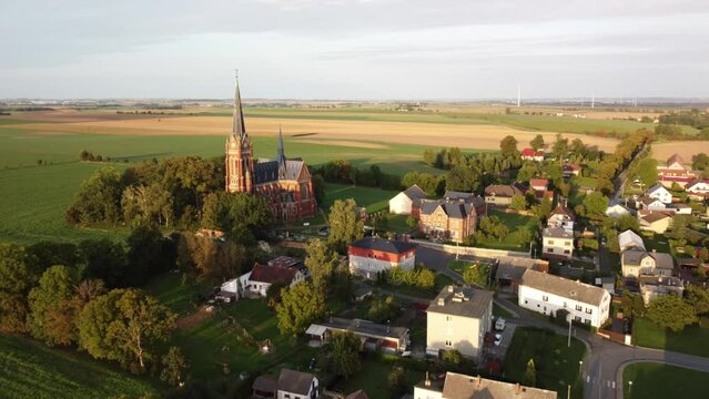 Opava District, Czech Republic - The Sight of the Jana Krtitele Church and the Surrounding Landscape in Sudice Village - Orbit Drone Shot