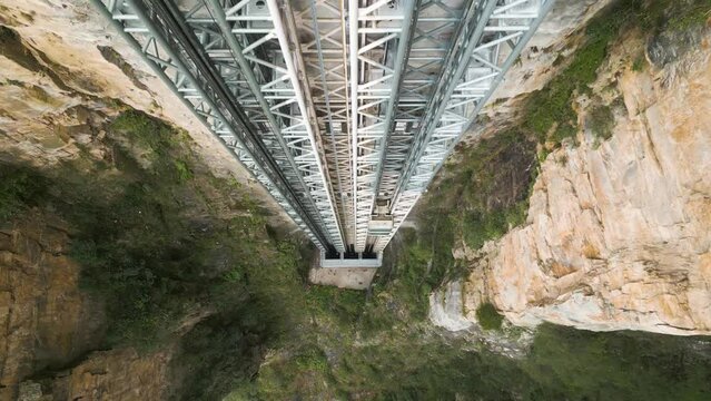Close ascending shot of the Bailong elevator lift leaving Zhangjiajie National Park, China