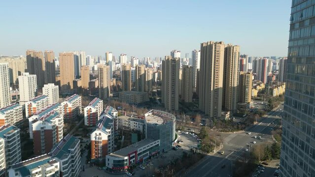 Aerial of residential locality in Linyi, Shandong Province, China, epitomizing the principles of modernity, urbanization, and the swift expansion of urban areas.