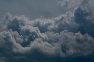 Cumulus clouds in the blue sky and weather forecasting; meteorological forecast