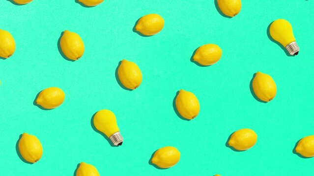 Animation. Fruit pattern of fresh, juicy lemons on acid green background. Top view. Food pop art design, creative summer concept. Many citrus in minimal flat lay style. Usable for wallpaper, ad