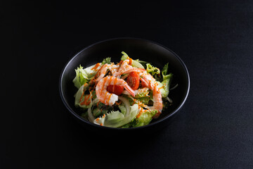 Japanese salad isolated in black background