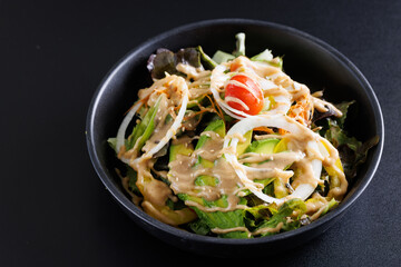 Japanese salad isolated in black background