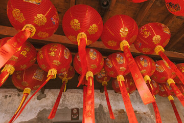 Fototapeta premium Red Chinese lanterns in the temple in China town, Bangkok.