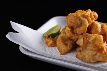Chicken Karaage Japanese Fried chicken isolated in black background