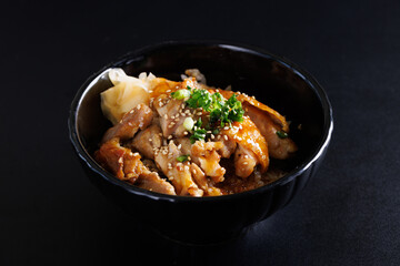 Grilled Chicken teriyaki rice Japanese food isolated in black background