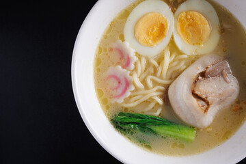 Ramen Japanese noodle isolated in black background