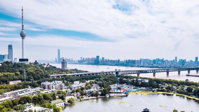 Timelapse photography of cityscape of Guishan TV Tower and Wuhan Yangtze River Bridge in Wuhan, Hubei, China