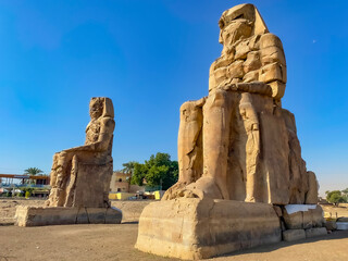 Colossi of Memnon, two massive stone statues representing the pharaoh, Luxor, Egypt
