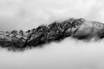 Snowy mountain ridge in winter in black and white